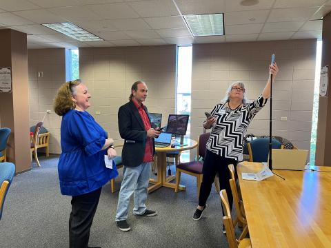 Renee Riser, Office of Distance Learning, demonstrates one of the tools available through the department's equipment library