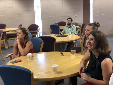 Instructors Ashley Mikolajczyk, Jason McNeely, Stacey Chamberlain, and Lisa Bowles during the celebration ceremony following the completion of the Course Design Practicum through the Office of Distance Learning.